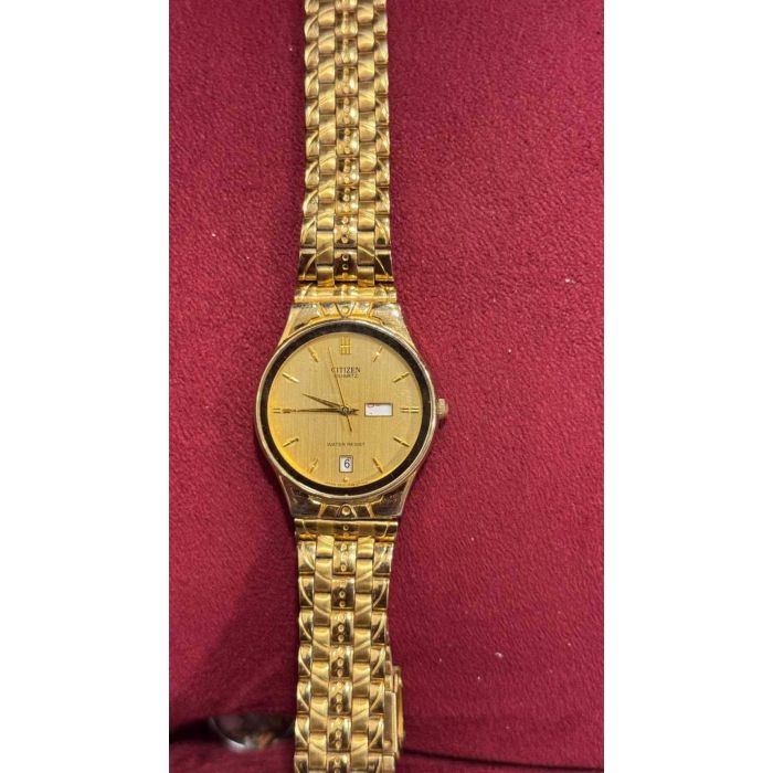 Citizen Vintage Quartz Day/Date Gold Tone Watch