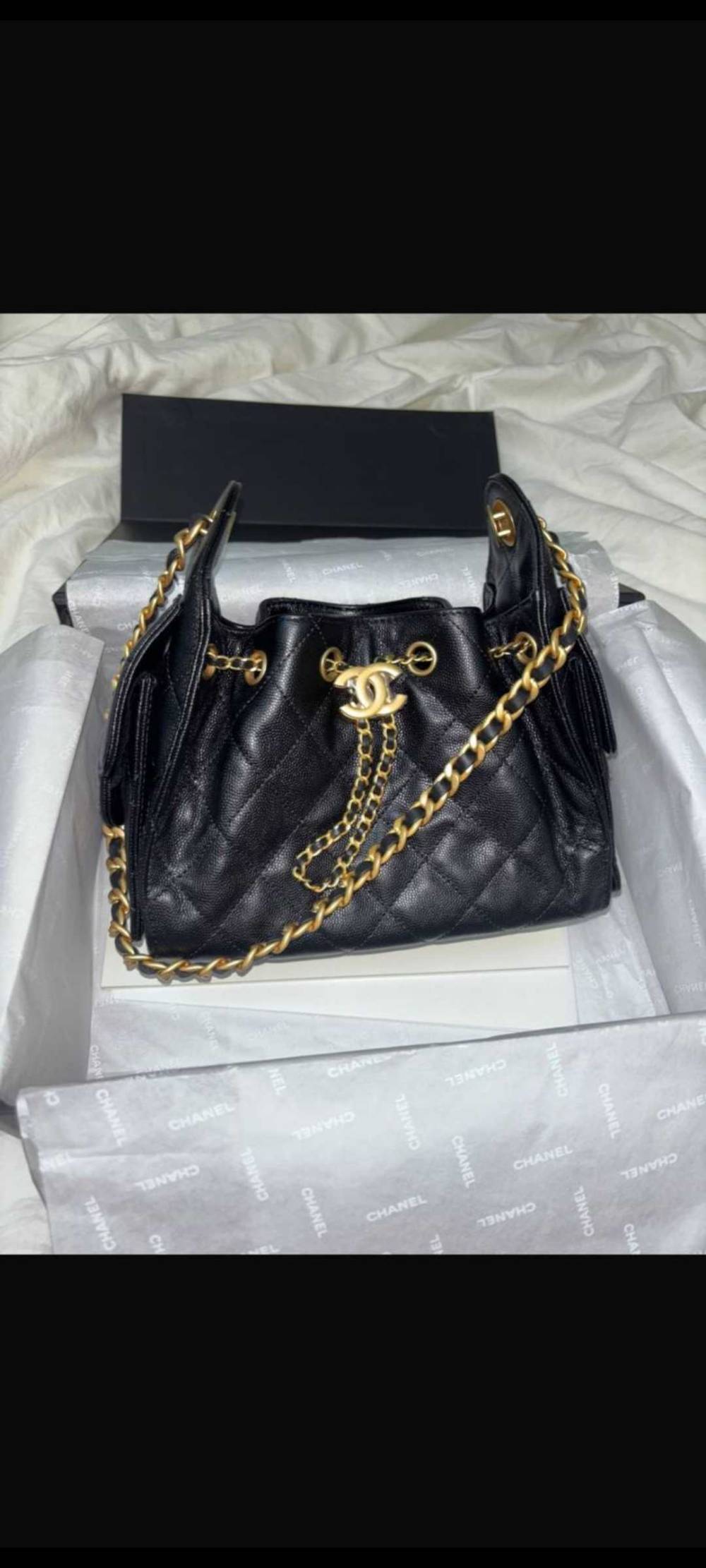Chanel 22S Mini Drawstring Bucket Bag Black Grained Calfskin Gold Hardware Microchip
